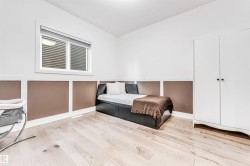 Bedroom featuring light wood finished floors - 