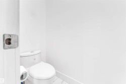 Bathroom with baseboards and marble look tiles - 