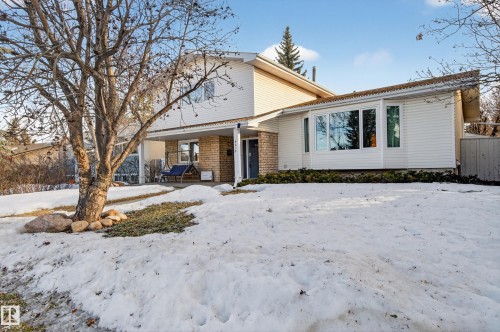 View of front of property featuring brick siding and covered porch - 9215 Ottewell Road, Edmonton, AB - Outdoor