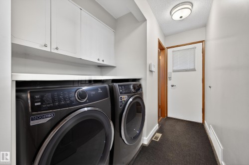 Virtual Image. Laundry is plumbed upstairs - 9215 Ottewell Road, Edmonton, AB - Indoor Photo Showing Laundry Room