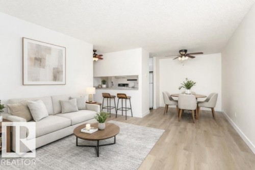 402 17467 98A Avenue Nw, Edmonton, AB - Indoor Photo Showing Living Room