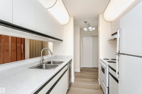 402 17467 98A Avenue Nw, Edmonton, AB - Indoor Photo Showing Kitchen With Double Sink