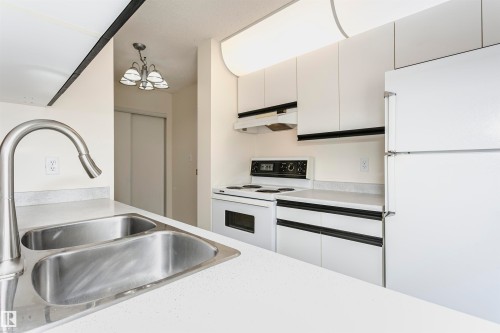 402 17467 98A Avenue Nw, Edmonton, AB - Indoor Photo Showing Kitchen With Double Sink