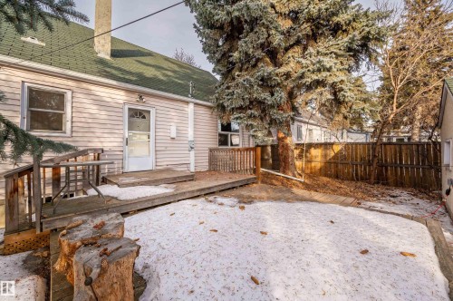 Fenced yard with a wooden deck - 6803 112A Street, Edmonton, AB - Outdoor