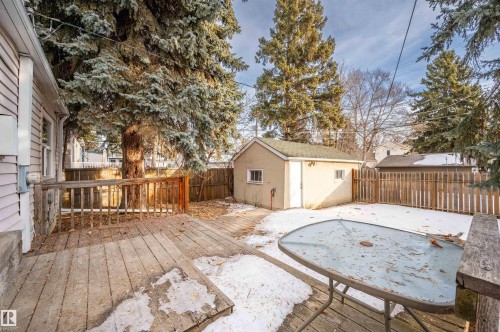 Wooden terrace with an outdoor structure and a fenced backyard - 6803 112A Street, Edmonton, AB - Outdoor With Deck Patio Veranda