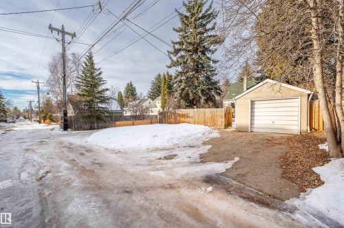 Snow covered garage with a detached garage - 6803 112A Street, Edmonton, AB - Outdoor