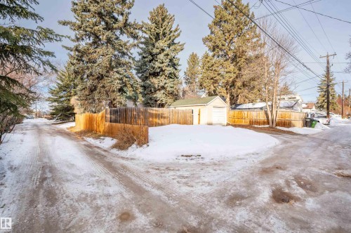 Yard layered in snow featuring an outbuilding - 6803 112A Street, Edmonton, AB - Outdoor