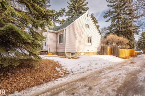 View of side of property with a shingled roof - 6803 112A Street, Edmonton, AB - Outdoor