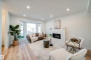 4019 37 Street, Edmonton, AB  - Indoor Photo Showing Living Room With Fireplace 