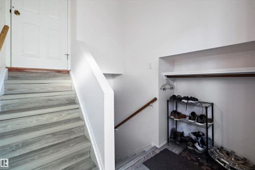Staircase featuring baseboards - 12117 91 Street, Edmonton, AB - Indoor Photo Showing Other Room