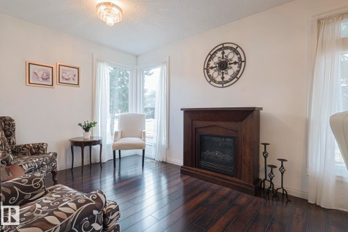 4112 43A Avenue, Leduc, AB - Indoor Photo Showing Living Room With Fireplace