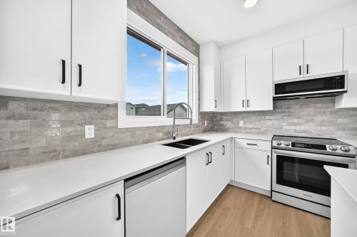 2332 159 Street Sw, Edmonton, AB - Indoor Photo Showing Kitchen With Double Sink With Upgraded Kitchen