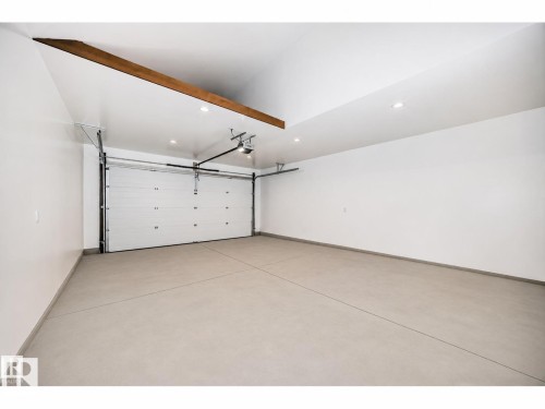 photo AI enhanced - 2332 159 Street Sw, Edmonton, AB - Indoor Photo Showing Garage