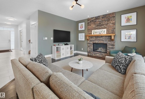 4212 Goresky Close, Edmonton, AB - Indoor Photo Showing Living Room With Fireplace