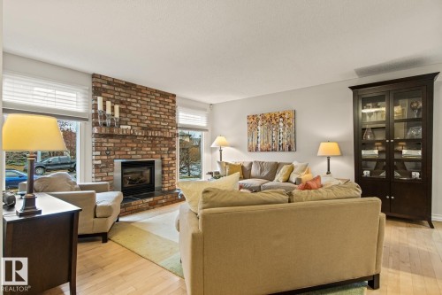 3 Wingate Place, St. Albert, AB - Indoor Photo Showing Living Room With Fireplace