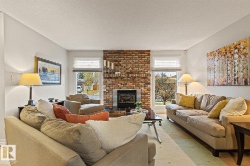 3 Wingate Place, St. Albert, AB - Indoor Photo Showing Living Room With Fireplace