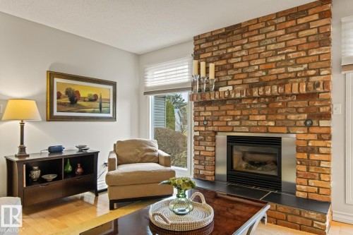 3 Wingate Place, St. Albert, AB - Indoor Photo Showing Living Room With Fireplace