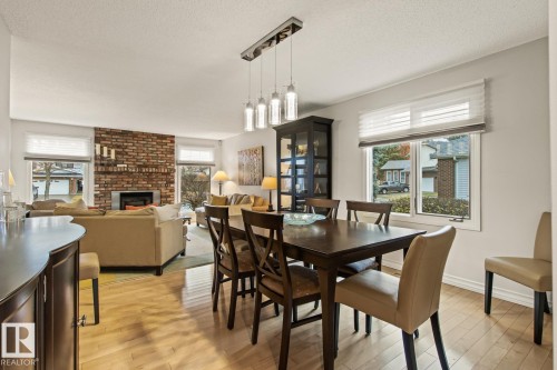 3 Wingate Place, St. Albert, AB - Indoor Photo Showing Dining Room With Fireplace