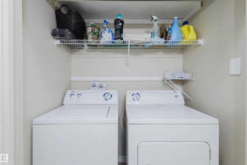 Laundry area featuring separate washer and dryer - 8420 Sloane Crescent, Edmonton, AB - Indoor Photo Showing Laundry Room
