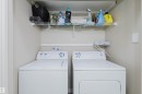 Laundry area featuring separate washer and dryer - 8420 Sloane Crescent, Edmonton, AB  - Indoor Photo Showing Laundry Room 