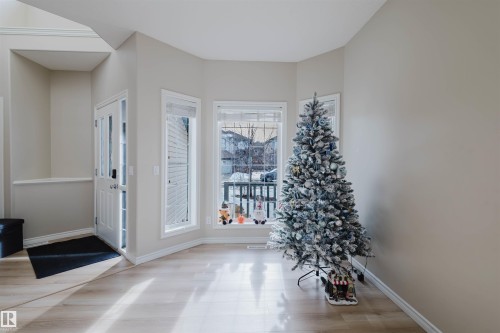 Entryway with baseboards - 8420 Sloane Crescent, Edmonton, AB - Indoor Photo Showing Other Room