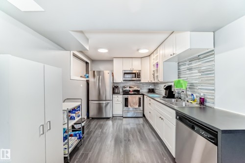 6111 18 Avenue Nw, Edmonton, AB - Indoor Photo Showing Kitchen With Double Sink
