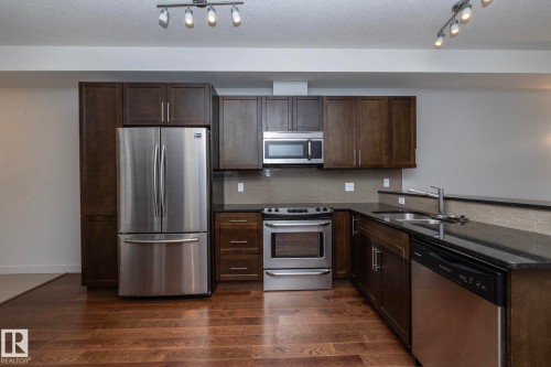213 10811 72 Avenue, Edmonton, AB - Indoor Photo Showing Kitchen With Double Sink