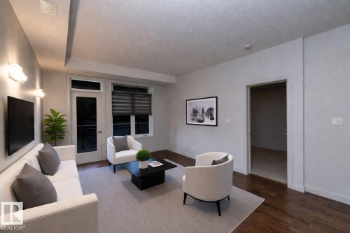 213 10811 72 Avenue, Edmonton, AB - Indoor Photo Showing Living Room
