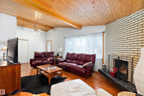 7 Mohawk Crescent, Leduc, AB - Indoor Photo Showing Living Room With Fireplace