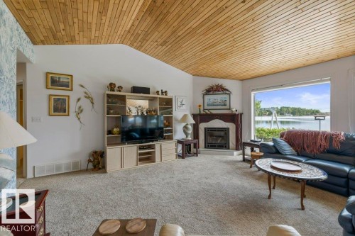 3013A Twp Rd 574, Rural Barrhead County, AB - Indoor Photo Showing Living Room With Fireplace
