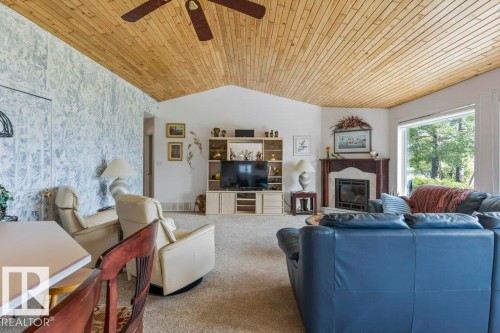 3013A Twp Rd 574, Rural Barrhead County, AB - Indoor Photo Showing Living Room With Fireplace