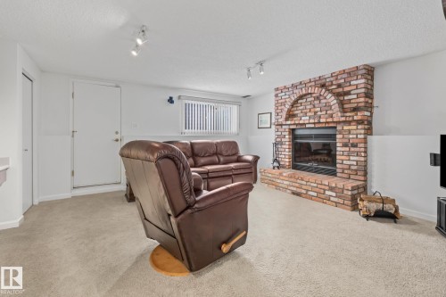 9512 180A Avenue, Edmonton, AB - Indoor Photo Showing Living Room With Fireplace