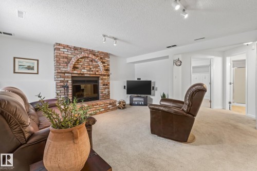 9512 180A Avenue, Edmonton, AB - Indoor Photo Showing Living Room With Fireplace