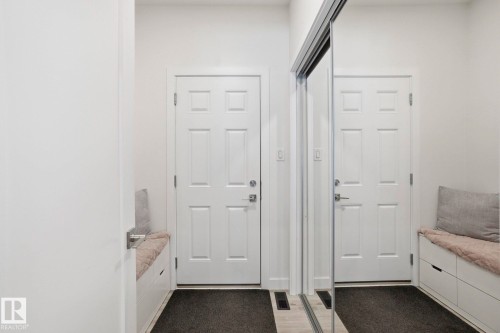Entryway with wood finished floors - 16627 31 Avenue, Edmonton, AB - Indoor Photo Showing Other Room