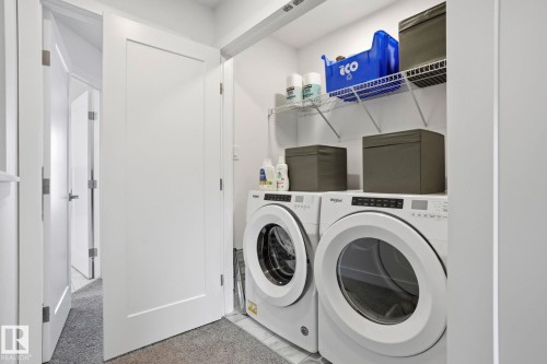 Laundry area with washing machine and dryer - 16627 31 Avenue, Edmonton, AB - Indoor Photo Showing Laundry Room