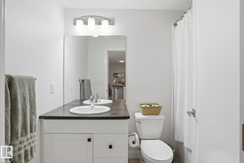 Bathroom featuring a shower with curtain and vanity - 16627 31 Avenue, Edmonton, AB - Indoor Photo Showing Bathroom