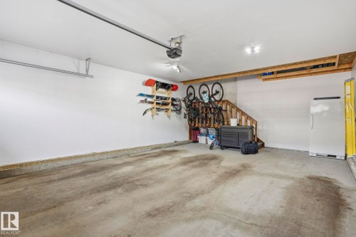 Garage with freestanding refrigerator - 16627 31 Avenue, Edmonton, AB - Indoor Photo Showing Garage