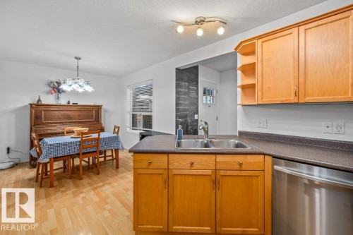 69 Erie Street, Devon, AB - Indoor Photo Showing Kitchen With Double Sink