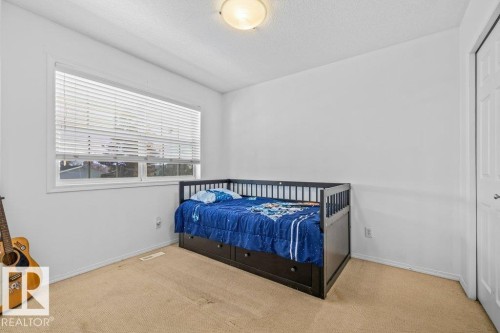 69 Erie Street, Devon, AB - Indoor Photo Showing Bedroom