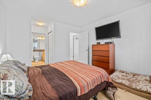 69 Erie Street, Devon, AB - Indoor Photo Showing Bedroom