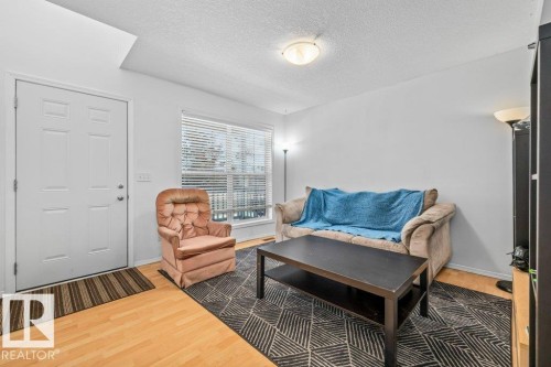 69 Erie Street, Devon, AB - Indoor Photo Showing Living Room
