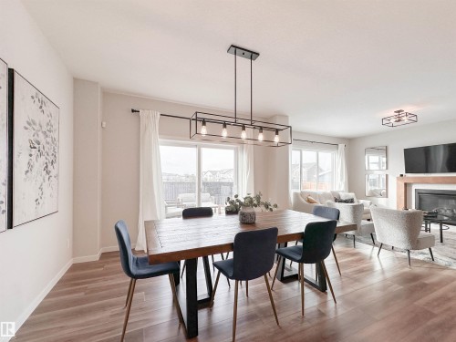 21 Riverhill Crescent, St. Albert, AB - Indoor Photo Showing Dining Room With Fireplace