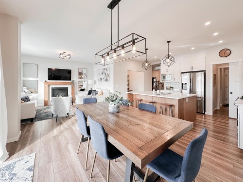 21 Riverhill Crescent, St. Albert, AB - Indoor Photo Showing Dining Room With Fireplace