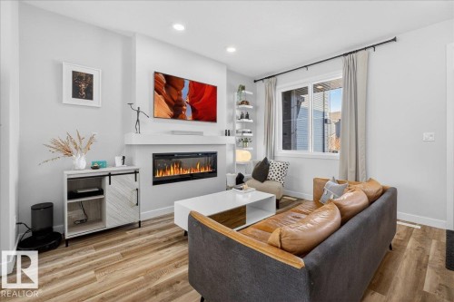 535 Paterson Way, Edmonton, AB - Indoor Photo Showing Living Room With Fireplace