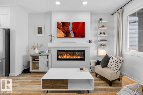 535 Paterson Way, Edmonton, AB - Indoor Photo Showing Living Room With Fireplace