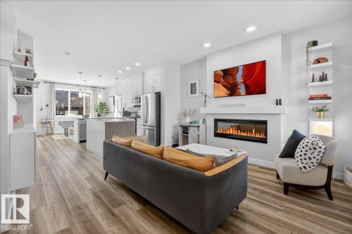 535 Paterson Way, Edmonton, AB - Indoor Photo Showing Living Room With Fireplace