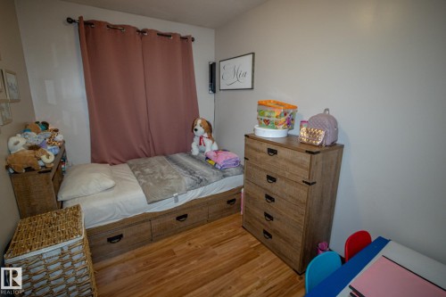 Bedroom with wood finished floors - 56430 Range Rd 113, Rural St. Paul County, AB - Indoor