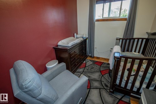 Bedroom with a crib - 56430 Range Rd 113, Rural St. Paul County, AB - Indoor
