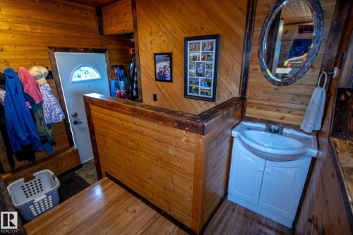 Interior space with vanity, wooden walls, and a dry bar - 56430 Range Rd 113, Rural St. Paul County, AB - Indoor Photo Showing Other Room