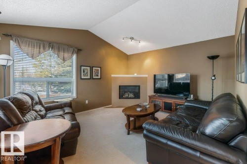 1916 Kramer Way, Edmonton, AB - Indoor Photo Showing Living Room With Fireplace